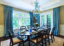 Stunning-dining-room-with-a-gorgeous-blue-chandelier-and-matching-drapes-217x155