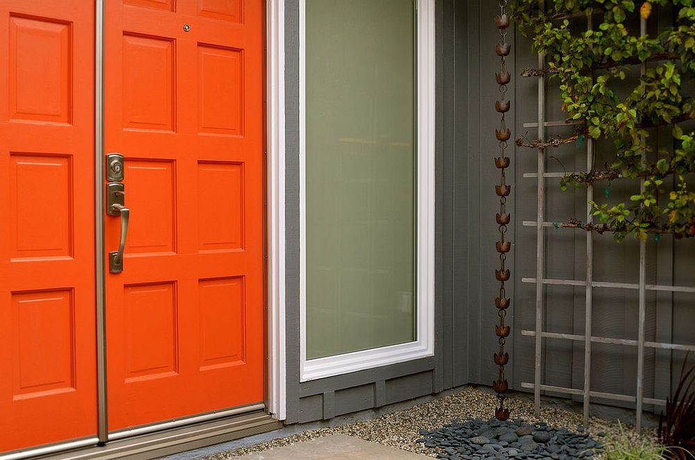 Stylish Asian entry in gray with bright orange door