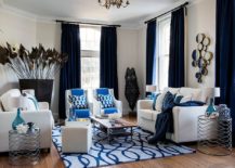 White-and-blue-color-palette-is-accentuated-by-the-dark-blue-drapes-217x155