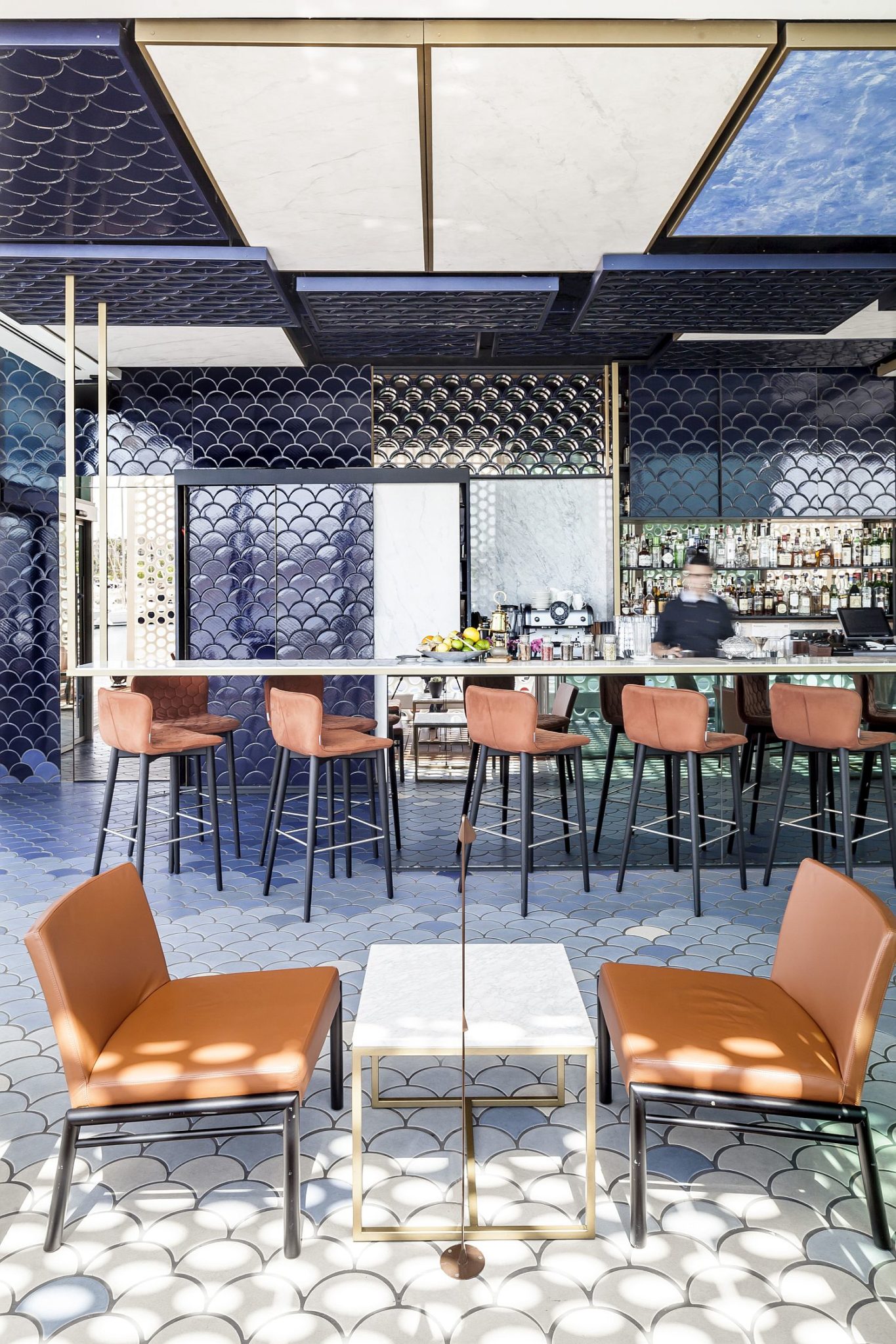 A break wave inspires the design of this cool bar in Barcelona