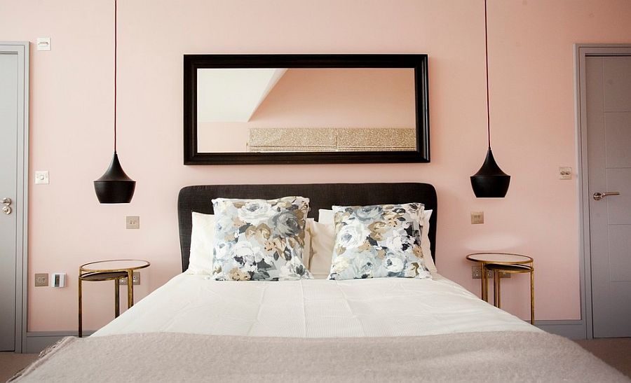 Black accentuates the beauty of pastel pink in the bedroom