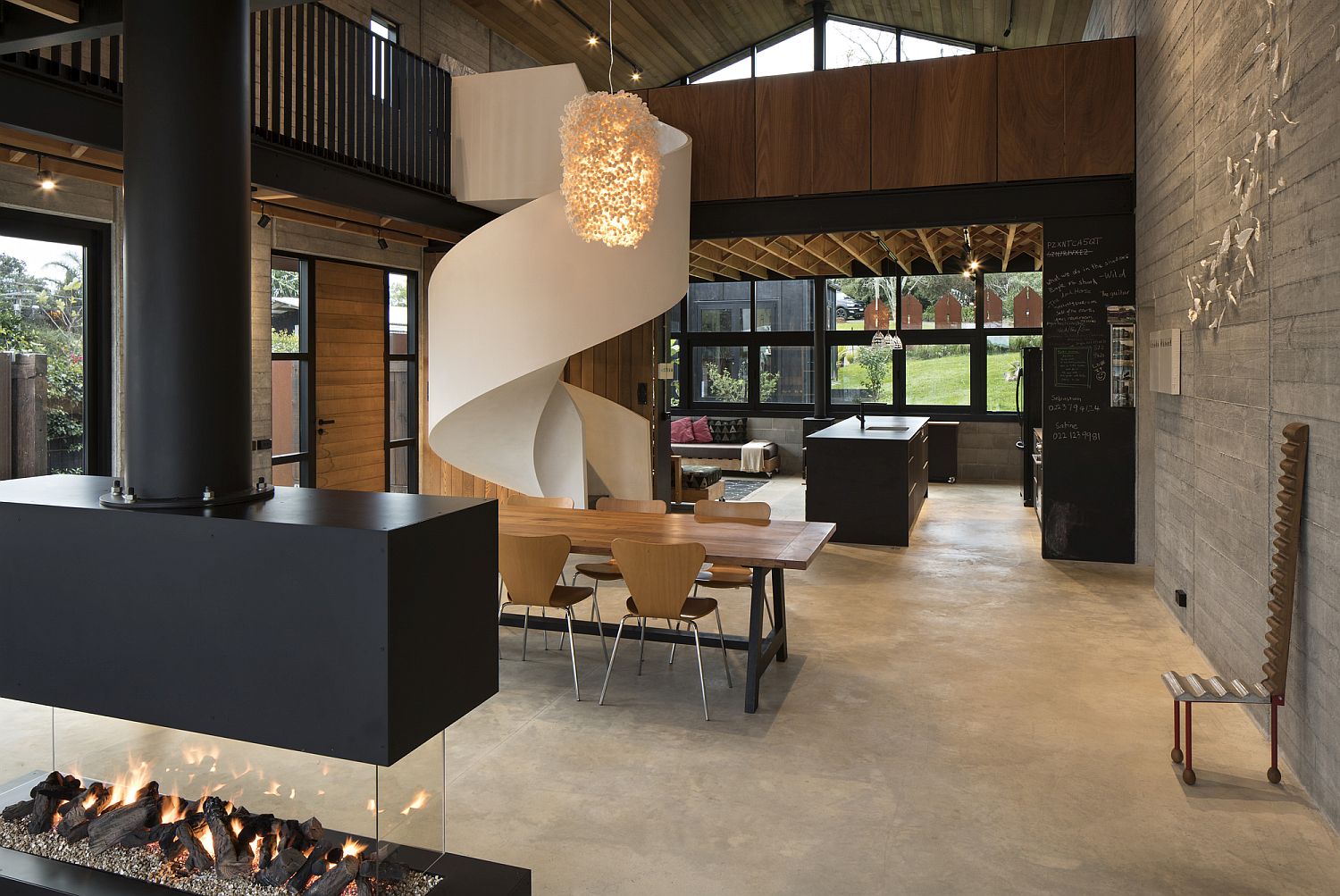 Chandelier above the dining room brings dazzling charm to the interior