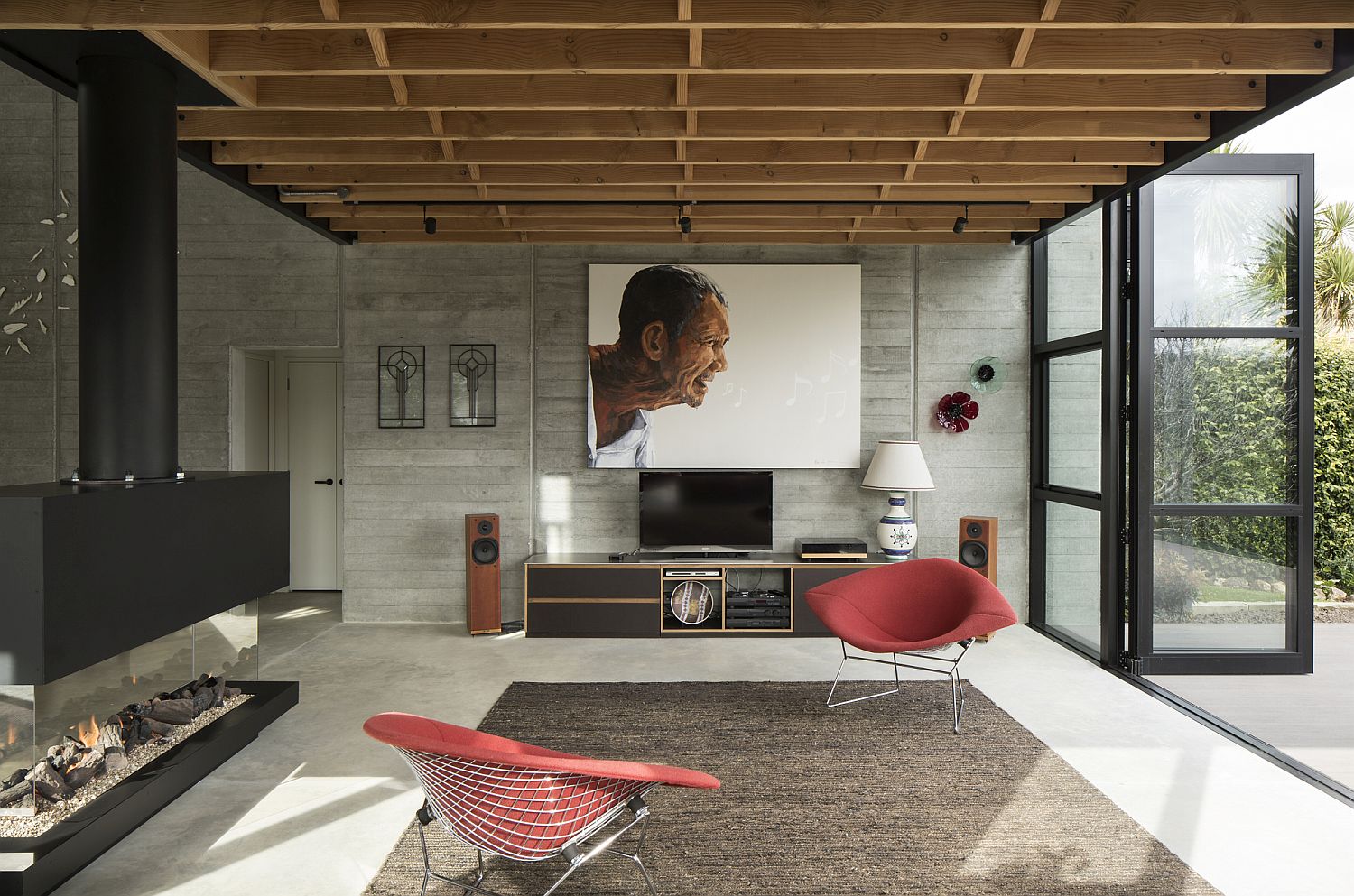 Contemporary fireplace in the sitting with access to the garden