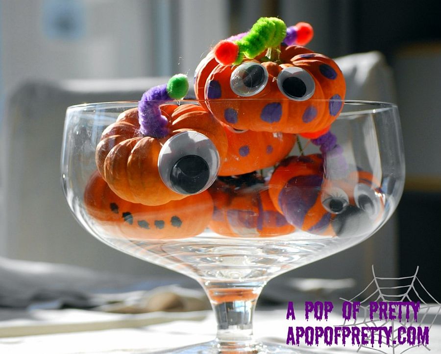 DIY mini pumpkin monsters are both fun and great for decorating Halloween table