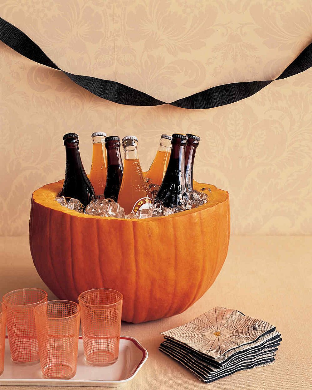 https://cdn.decoist.com/wp-content/uploads/2017/10/DIY-pumpkin-party-cooler.jpg