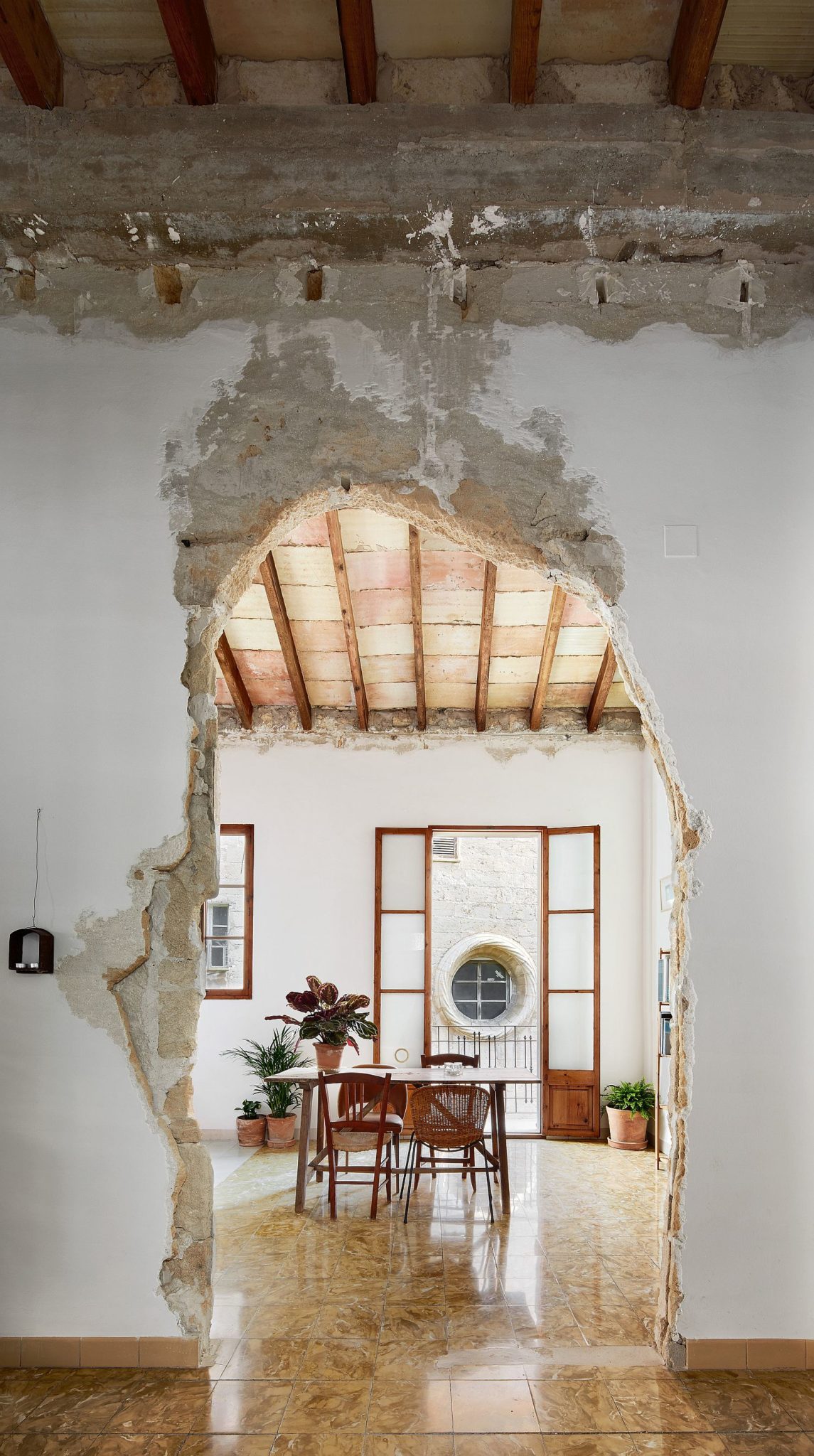 Dining area of the home connected to the balcony outside