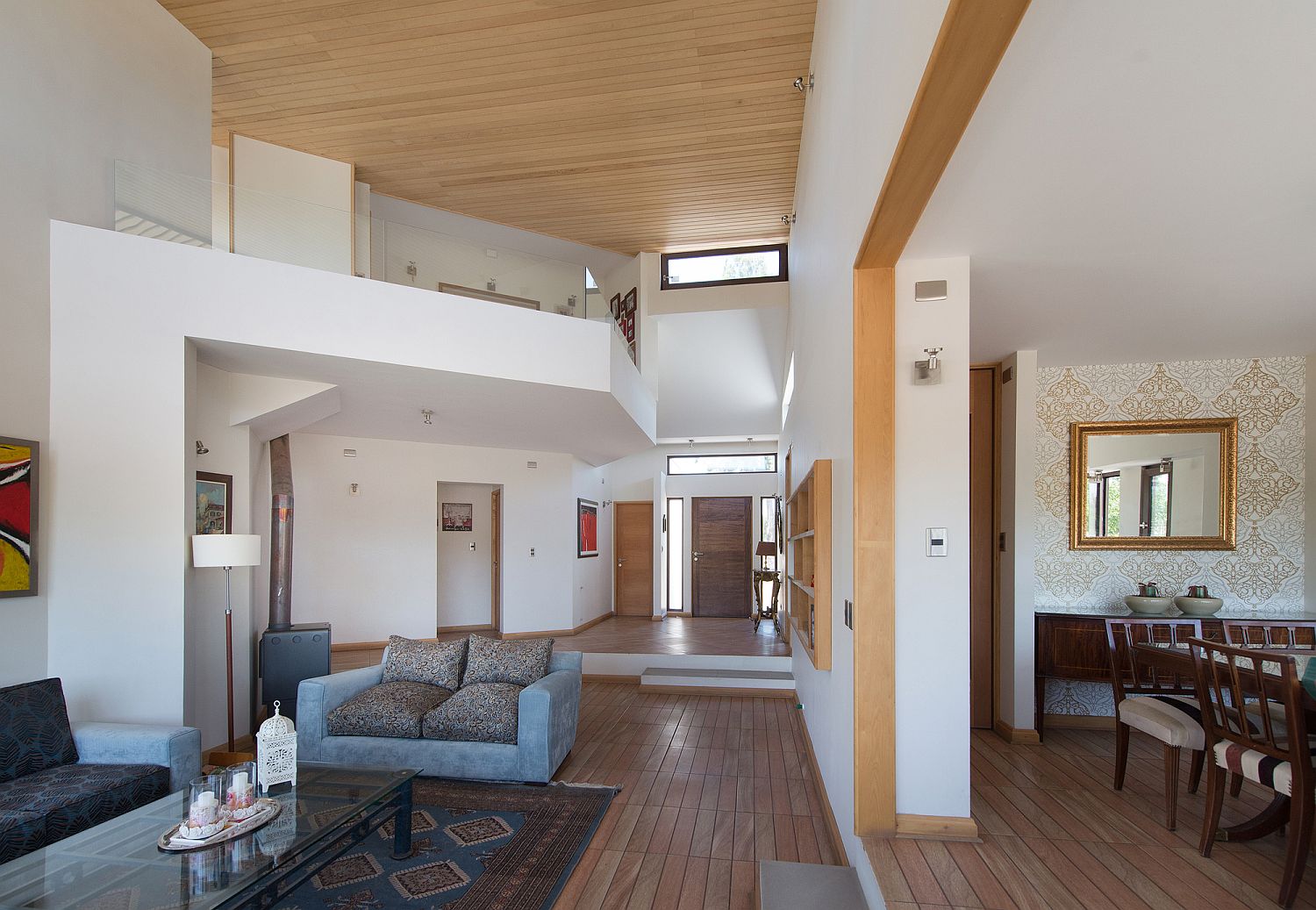 Double-height central living are and dining room of the home in Chile