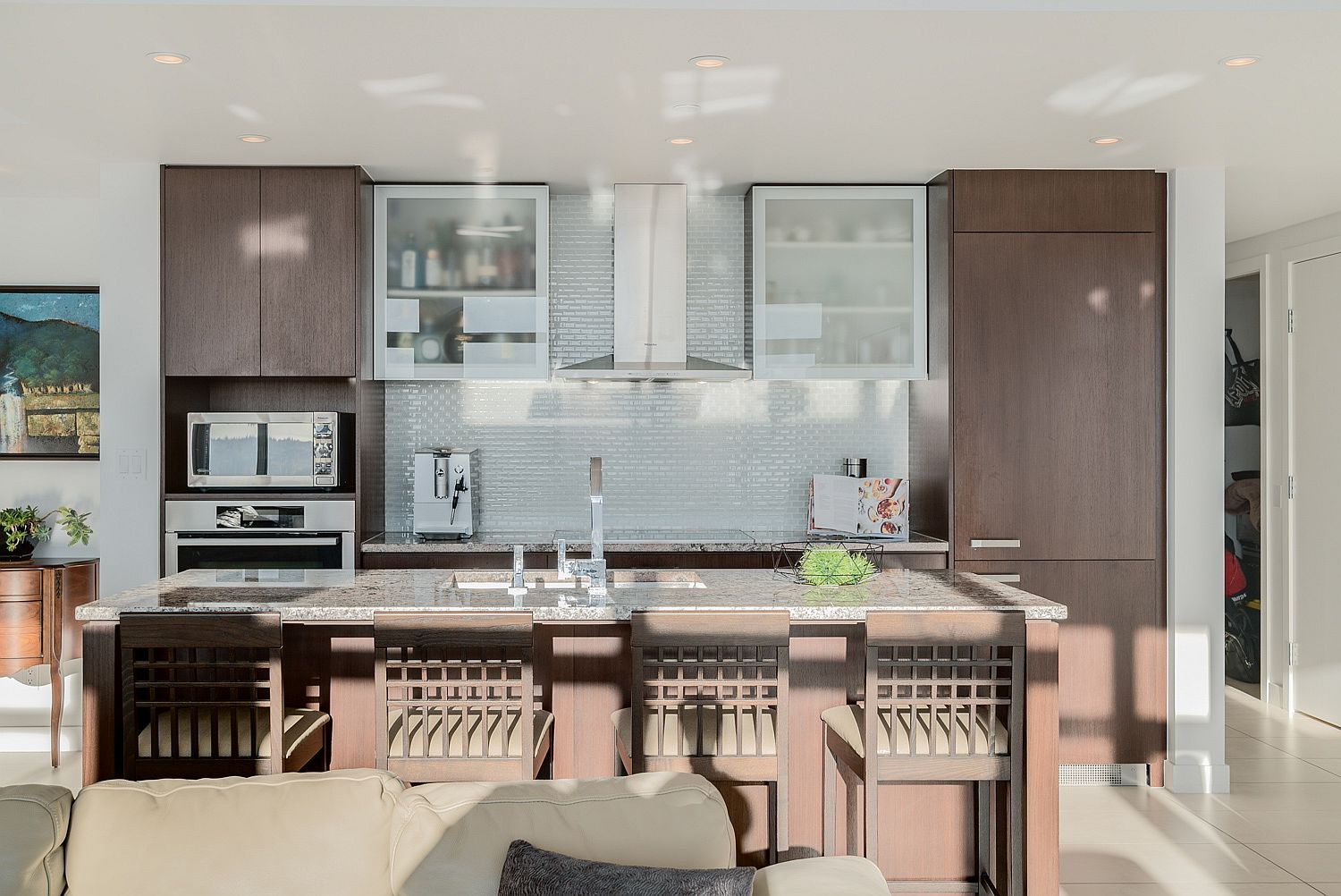 Elegant-and-efficinet-kitchen-in-white-with-brown-wooden-cabinets