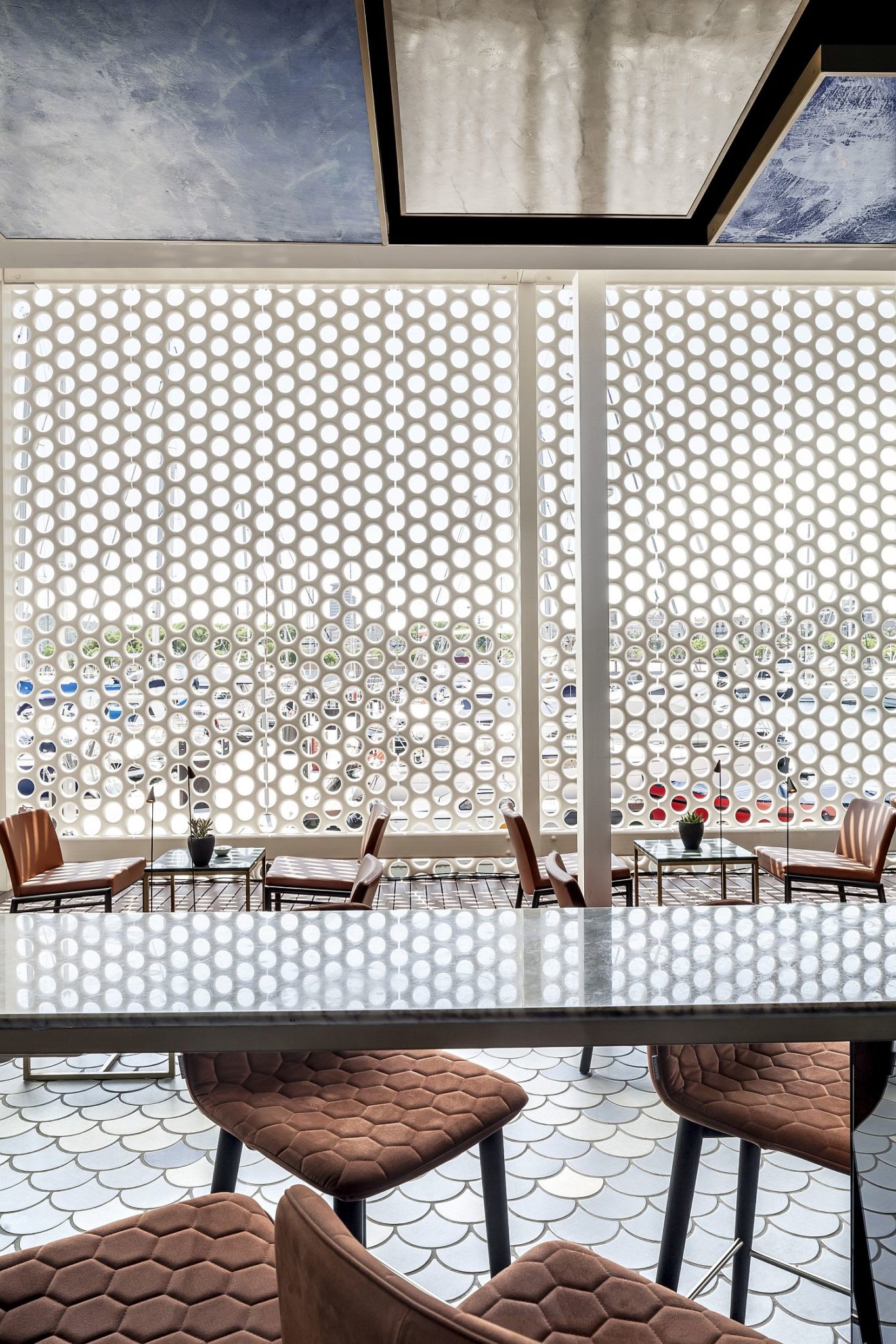 Existing-white-lattice-of-the-building-is-carefully-intertwined-with-the-bar-design