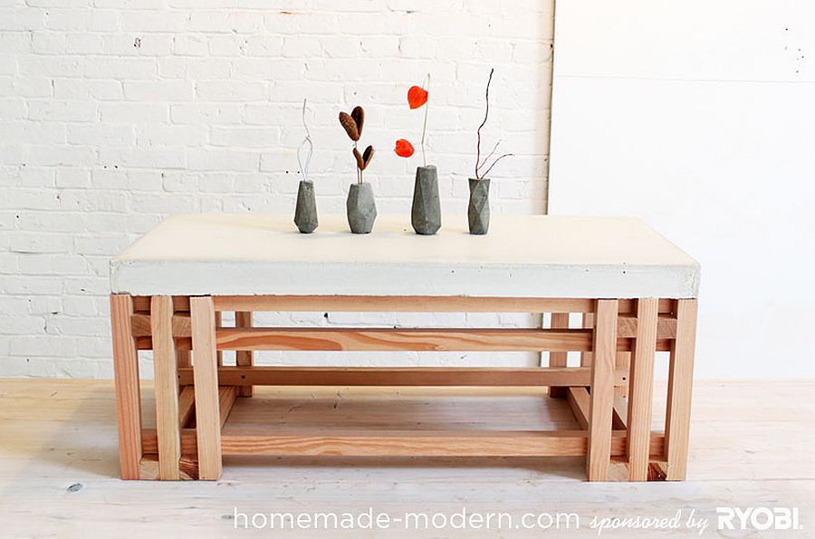 Fabulous concrete and wood coffee table also doubles as side table