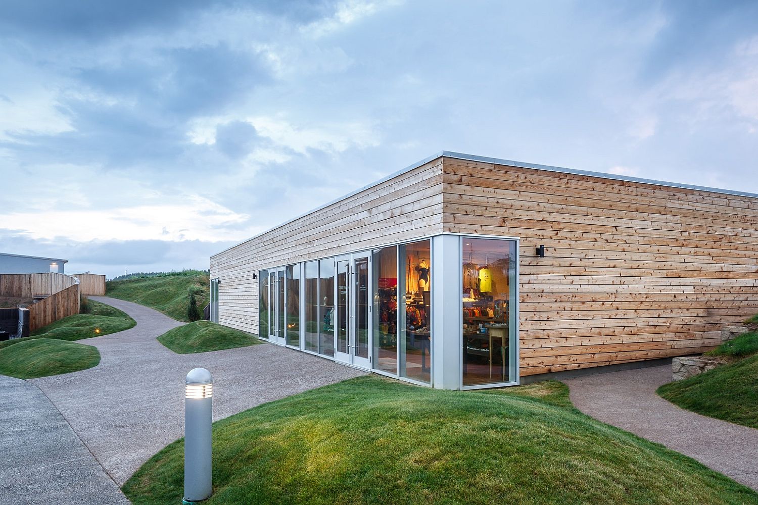 Facade of the cabins is crated using glass and wood slats