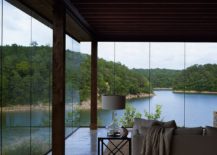 Frameless-walls-of-glass-turn-the-stunning-outdoors-into-backdrop-for-the-interior-217x155