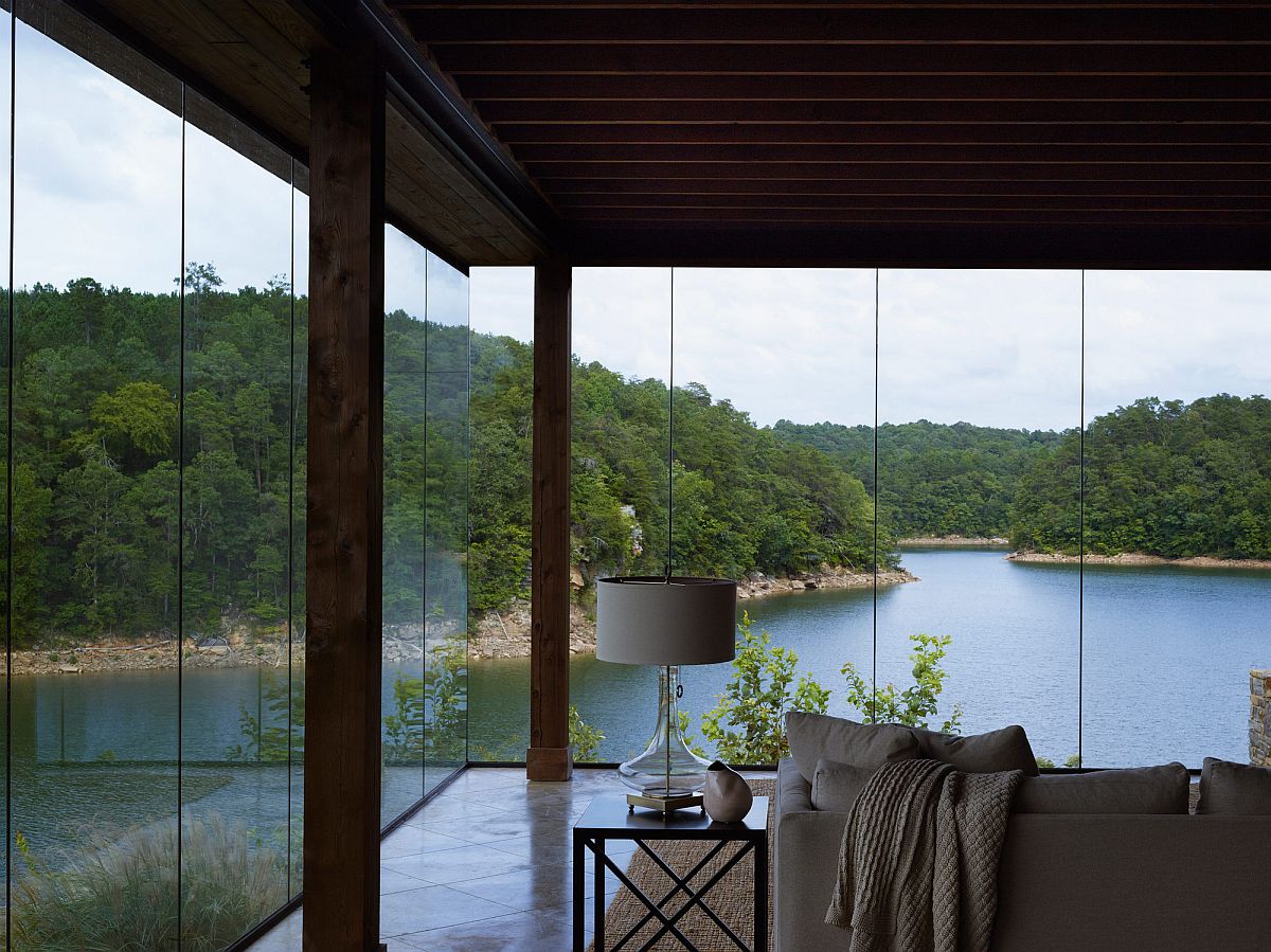 Frameless walls of glass turn the stunning outdoors into backdrop for the interior