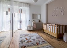 It-is-the-delightful-rug-that-steals-the-show-in-this-modern-nursery-217x155