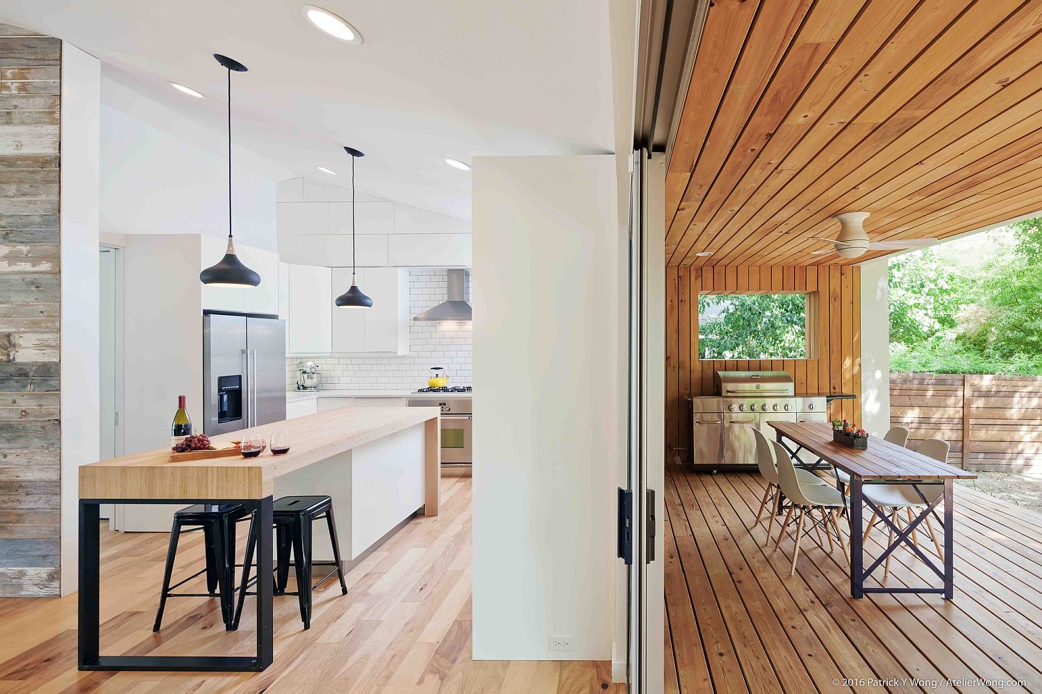 Kitchen-connected-with-the-wooden-deck-outside-has-an-extended-breakfast-zone