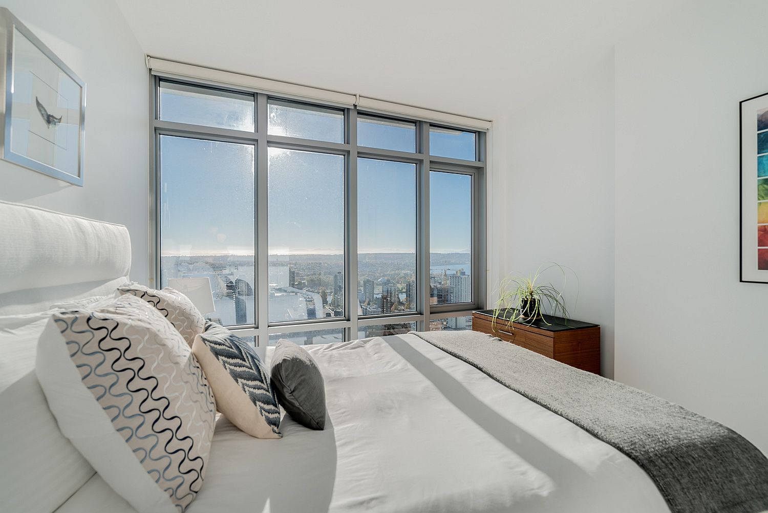 Light-filled bedroom also allows the homeowners to enjoy lovely sunsets