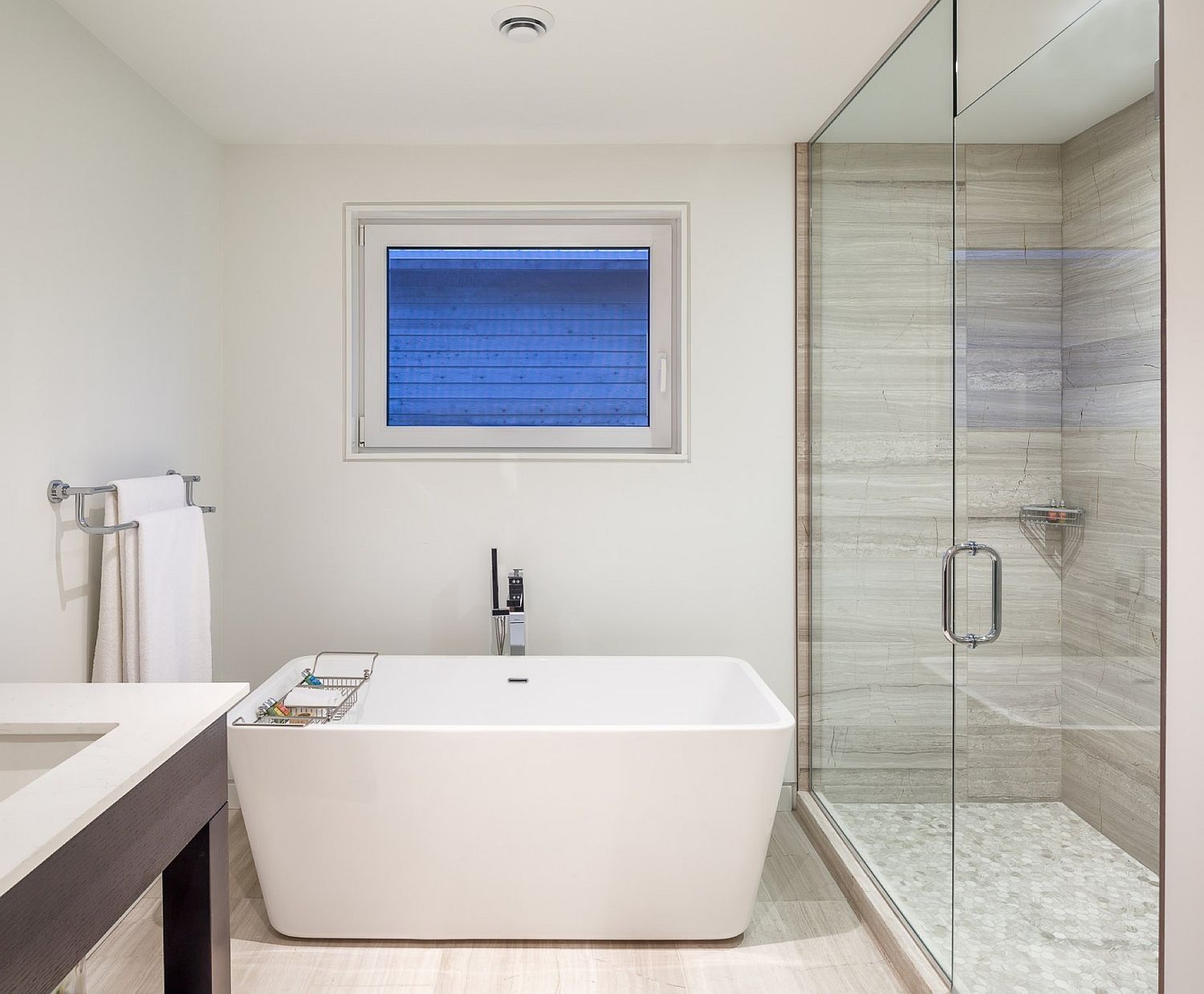 Modern bathroom in white with standalone bathtub