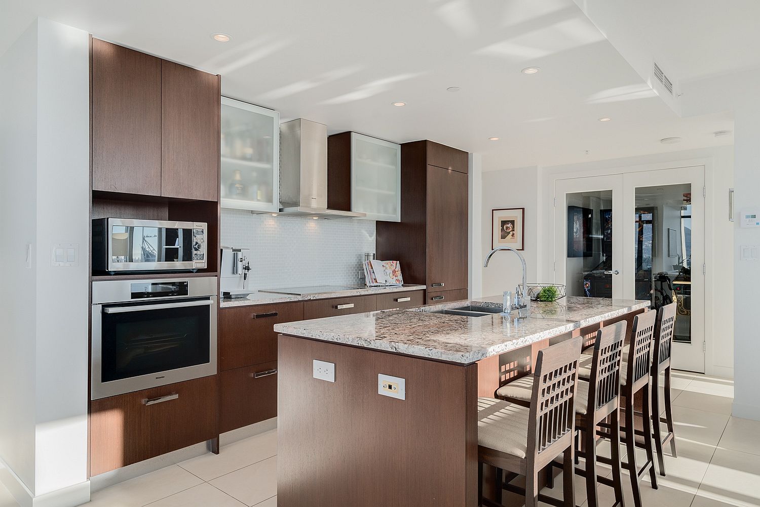 Modern kitchen with smart shelving, state-of-the-art appliances and space-savvy design