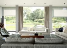 Modern-living-space-in-white-with-relaxing-decor-and-a-view-of-the-world-outside-217x155