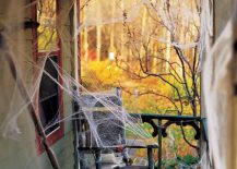 Porch-covered-in-cobwebs-makes-a-great-entry-on-Halloween-217x155