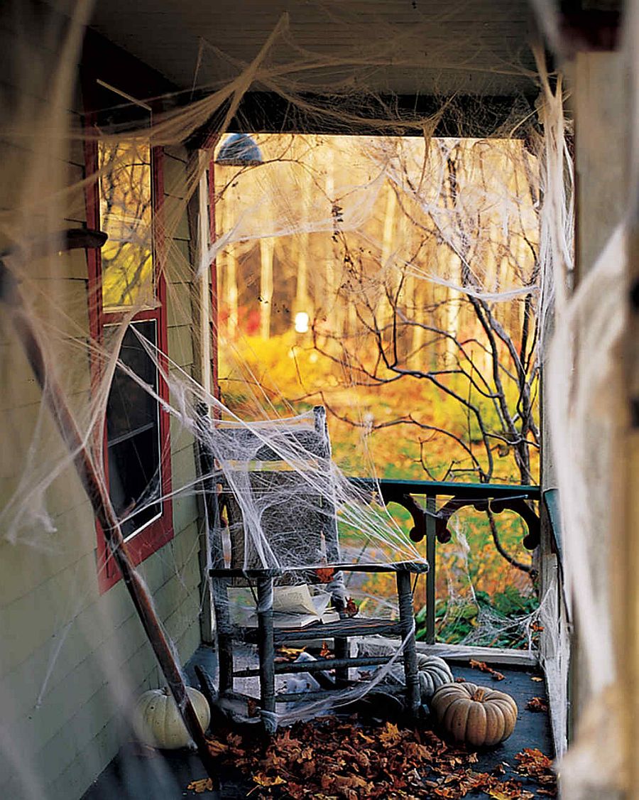 Porch covered in cobwebs makes a great entry on Halloween