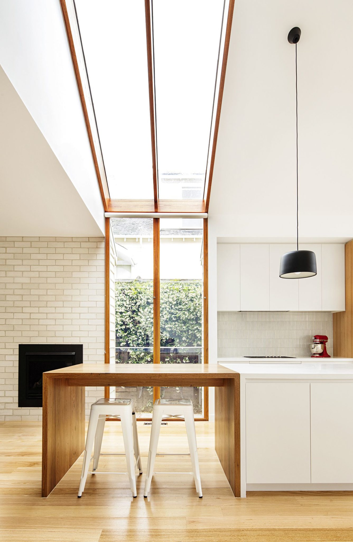 Skylights-and-smart-windows-bring-ample-light-into-the-kitchen