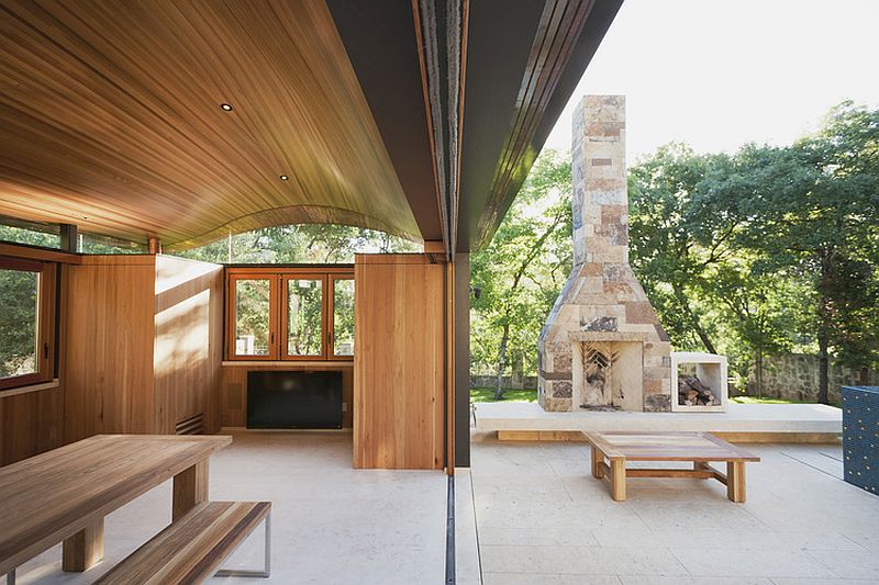 Sliding glass door system connect the poolhouse with the outdoor lounge