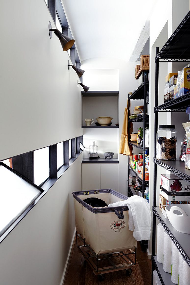 Squeezing-in-the-laundry-basket-on-wheels-into-the-narrow-kitchen