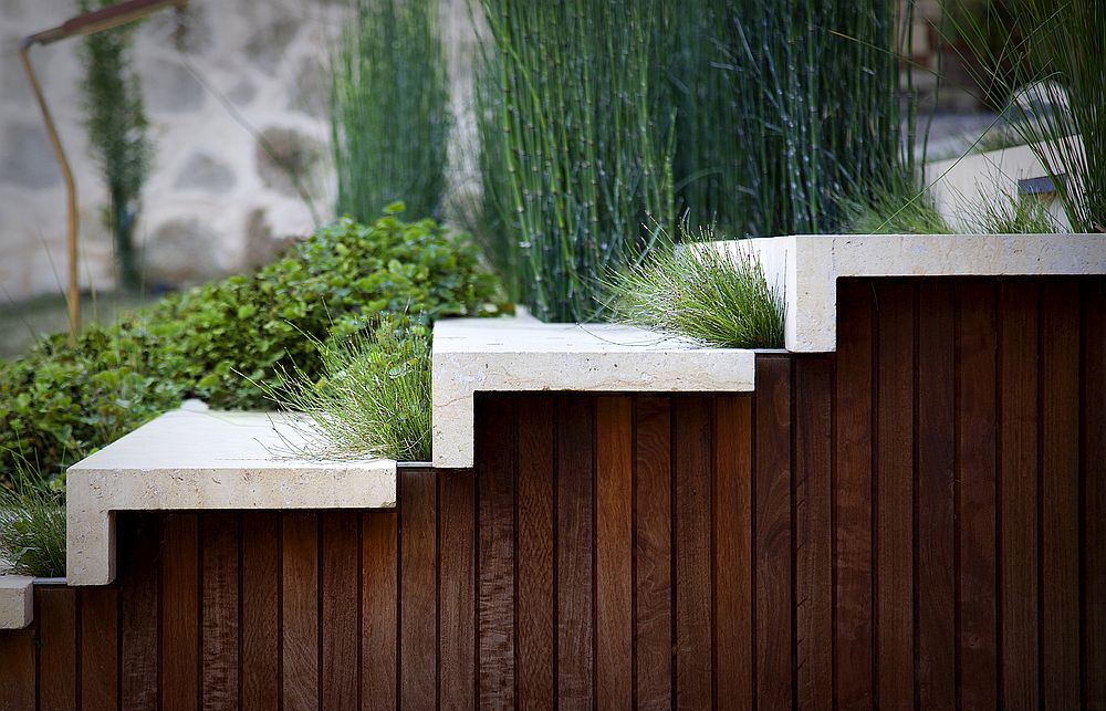 Staircase to the poolhouse is also covered in green