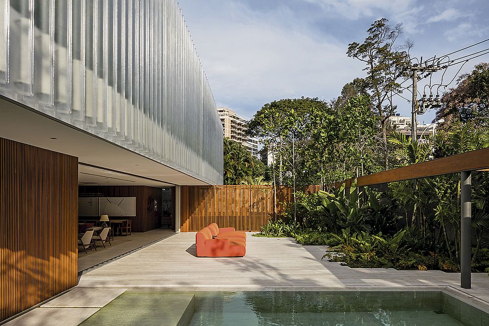 Sweeping-deck-next-to-the-pool-is-connected-to-the-interior