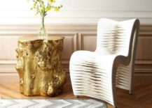 Tree-stump-side-table-spray-painted-in-gold-looks-simply-awesome-217x155