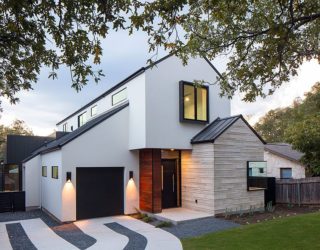 Multiple Gable Roofs and Dark Accents Shape an Exceptional Street Façade