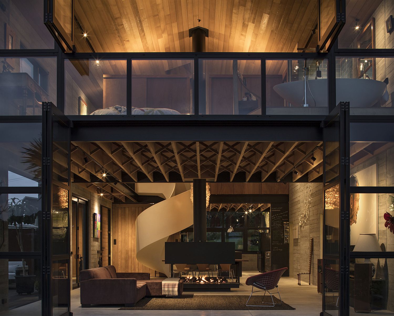 Wall-of-glass-windows-and-doors-opens-up-the-interior-to-the-view-outside