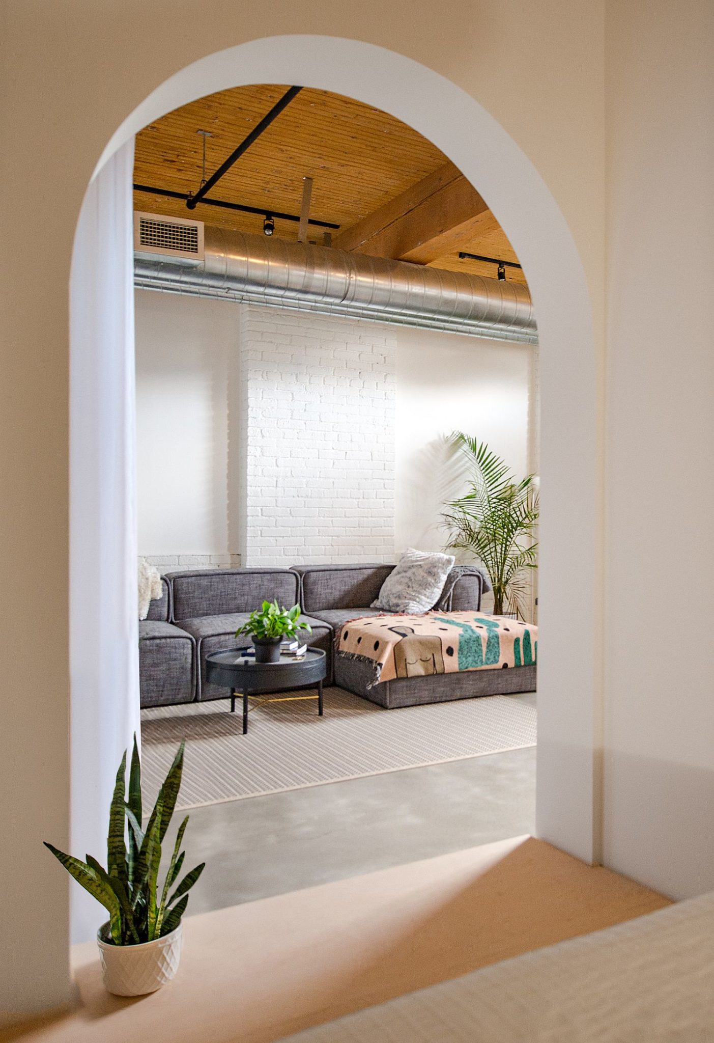 Arched doorways and entryways give the loft a unique look