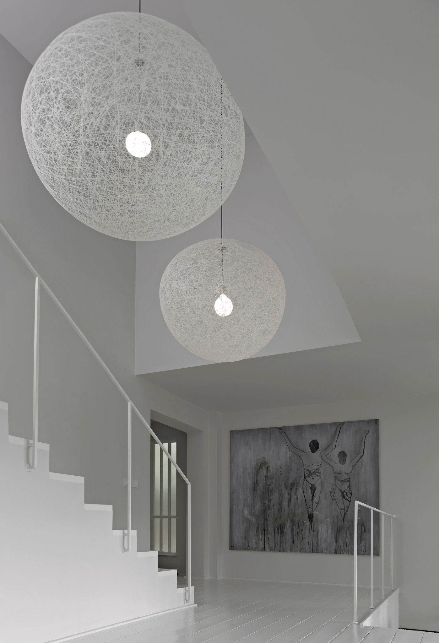 Beautiful Moooi pendants steal the show inside the home even while blending into the backdrop