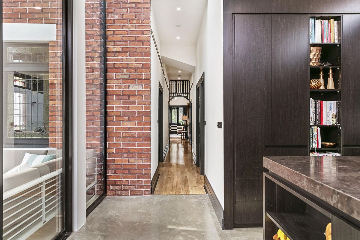 Brickwork throughout the house reminds the owners of its past