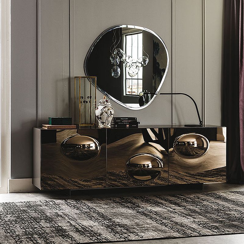 Bronze convex mirrored glass creates a cool sideboard with plenty of glint