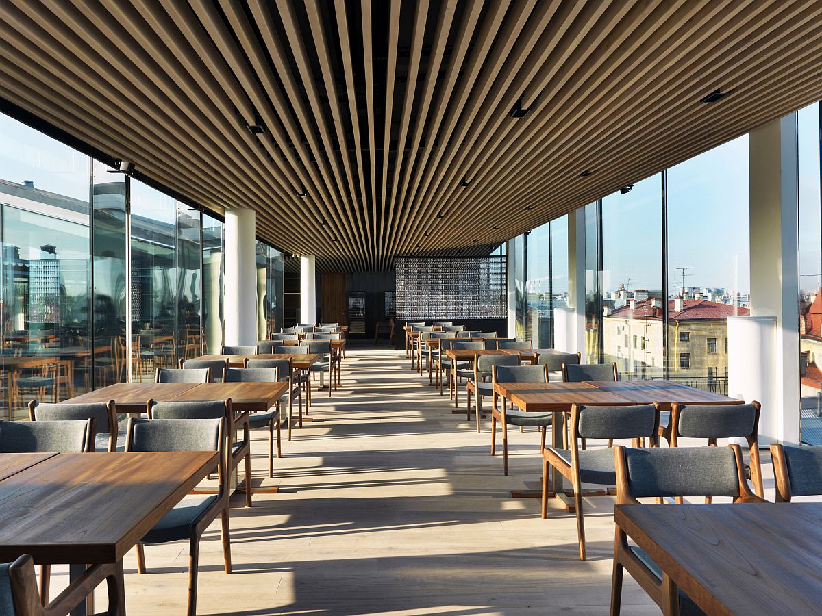 Carefully spaced oak strips create a unique restaurant ceiling