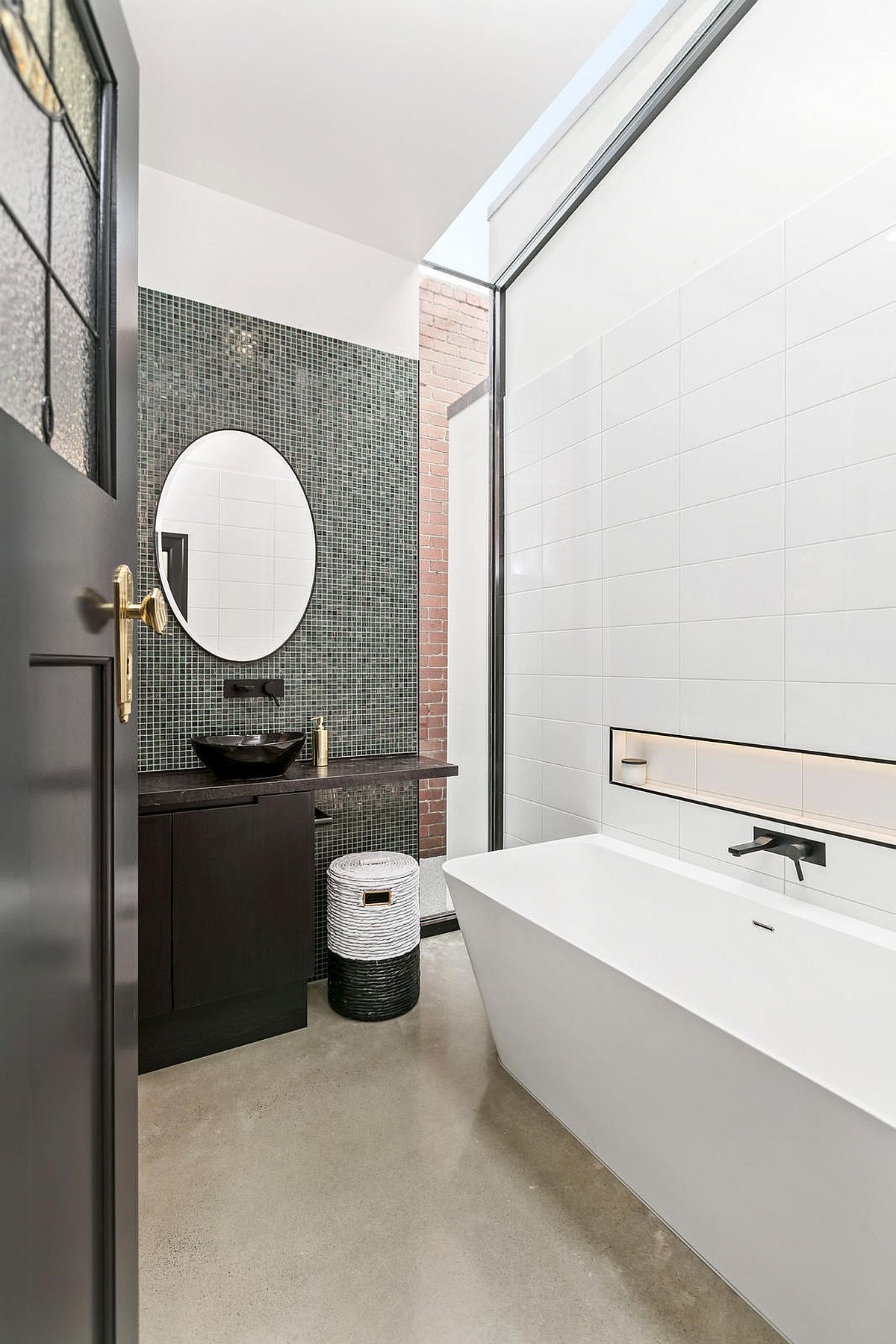 Contemporary bathroom in white with a dark accent wall and a dash of red