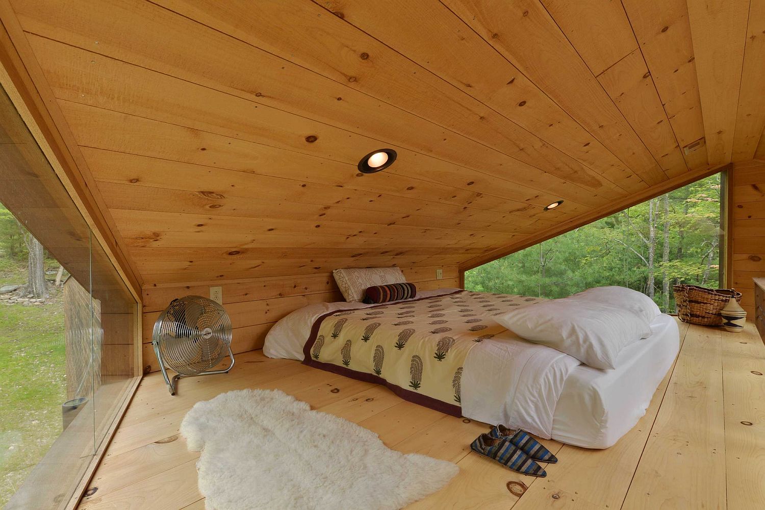 Cozy and minimal loft level bedroom of the treehouse