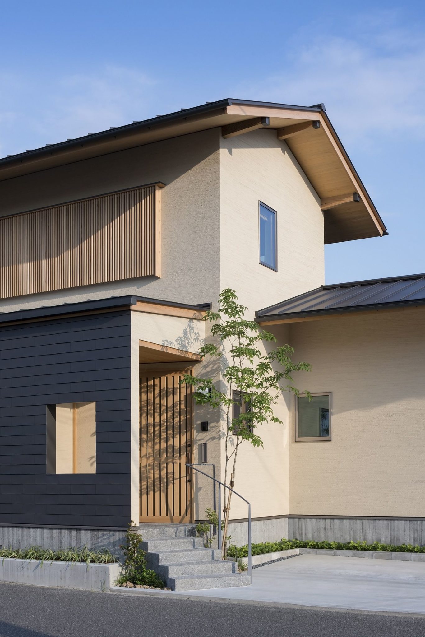 Entrance to the modern home in Japan built for elderly couple