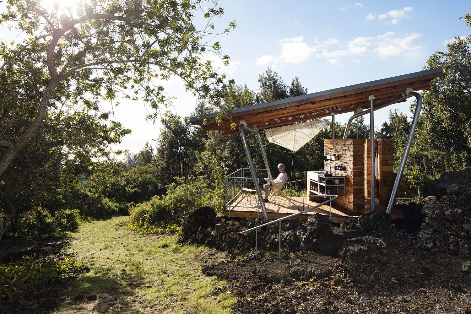 Fabulous pavilion style outdoor house sits above the 300-year old lava flow