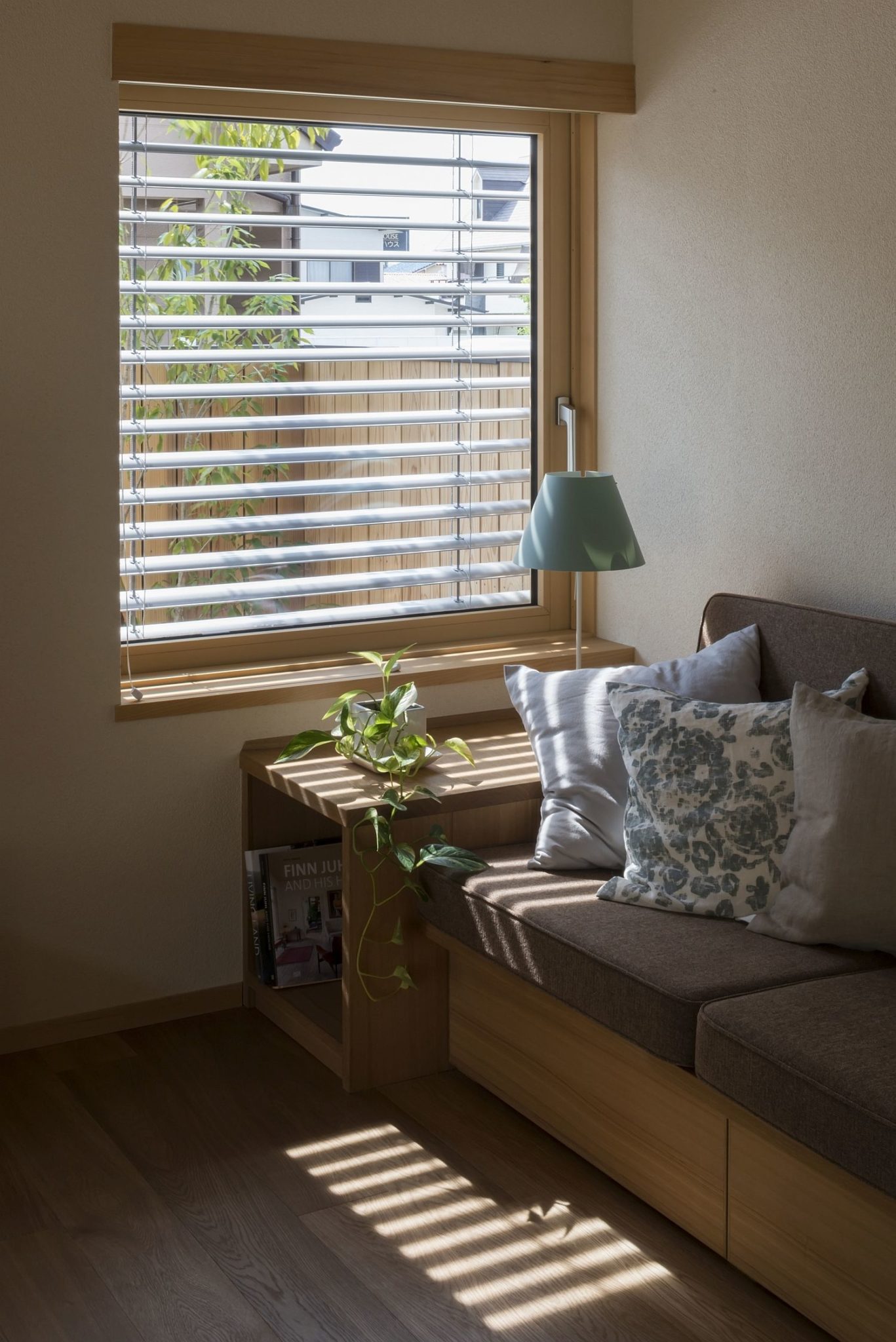 Filtered sunlight enters the living room of the home