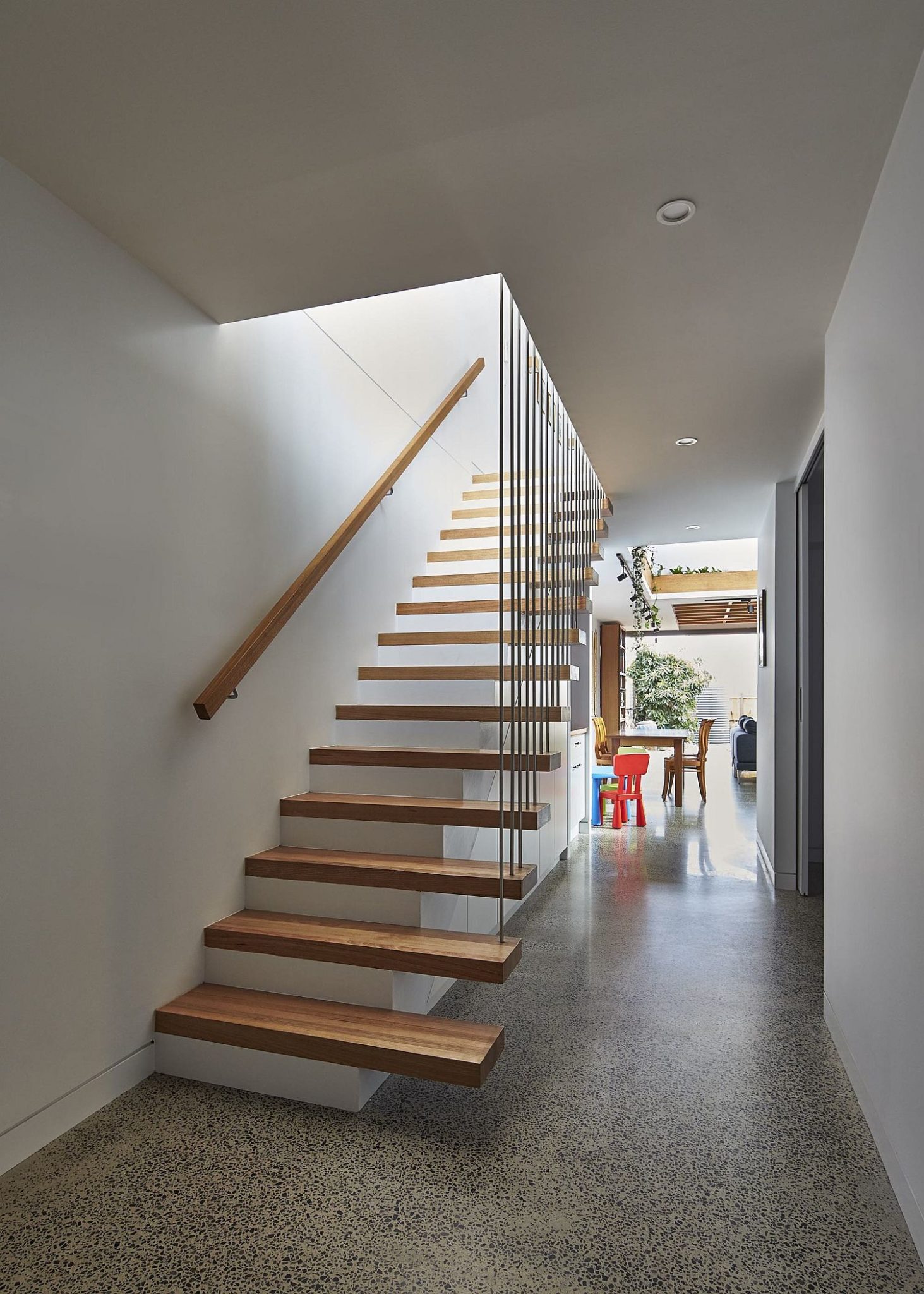 Floating wooden staircase inside the home