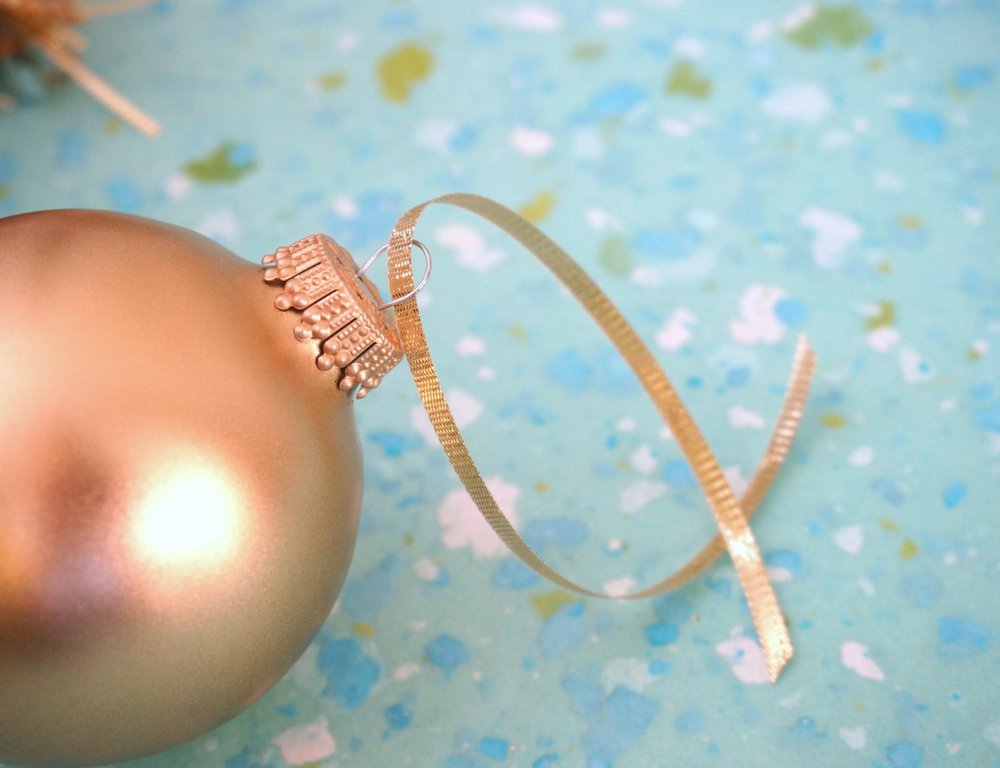 Gold ornament and ribbon