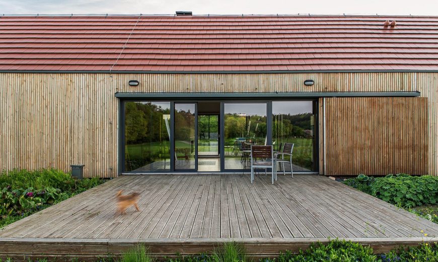 Dual Decks and a Cloak of Green: Modern Classic Home in Poland