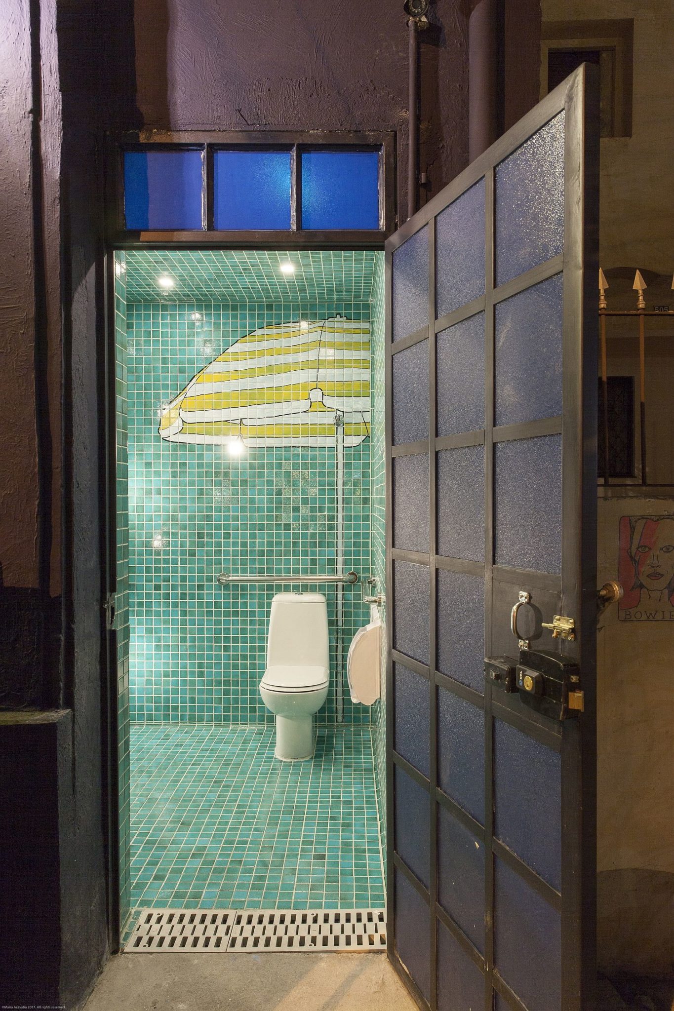 Green-tiled-restroom-of-the-Pizzeria