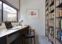 Light-filled-home-office-with-large-bookshelf-217x155