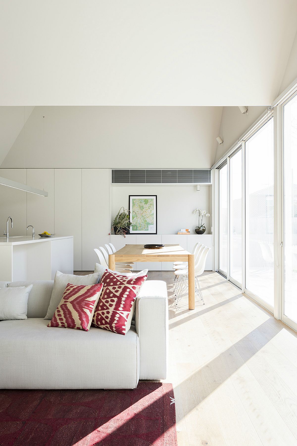 Light-filled living area and dining room of the revamped Melbourne home