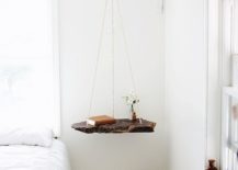 Live-edge-hanging-shelf-used-as-a-bedside-table-217x155